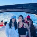 Friends enjoying open bar on a private yacht in Cabo