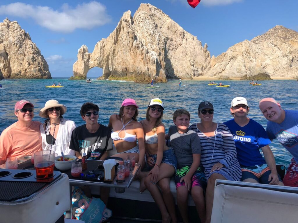 Group celebration on a yacht at the Arch, Cabo San Lucas