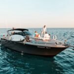 All-inclusive 46 ft luxury yacht cruising at sunset in Cabo